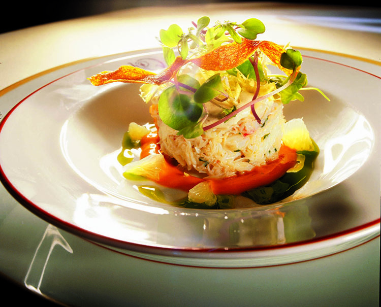 peekytoe crab salad with coriander and cumin in a carrot coulis